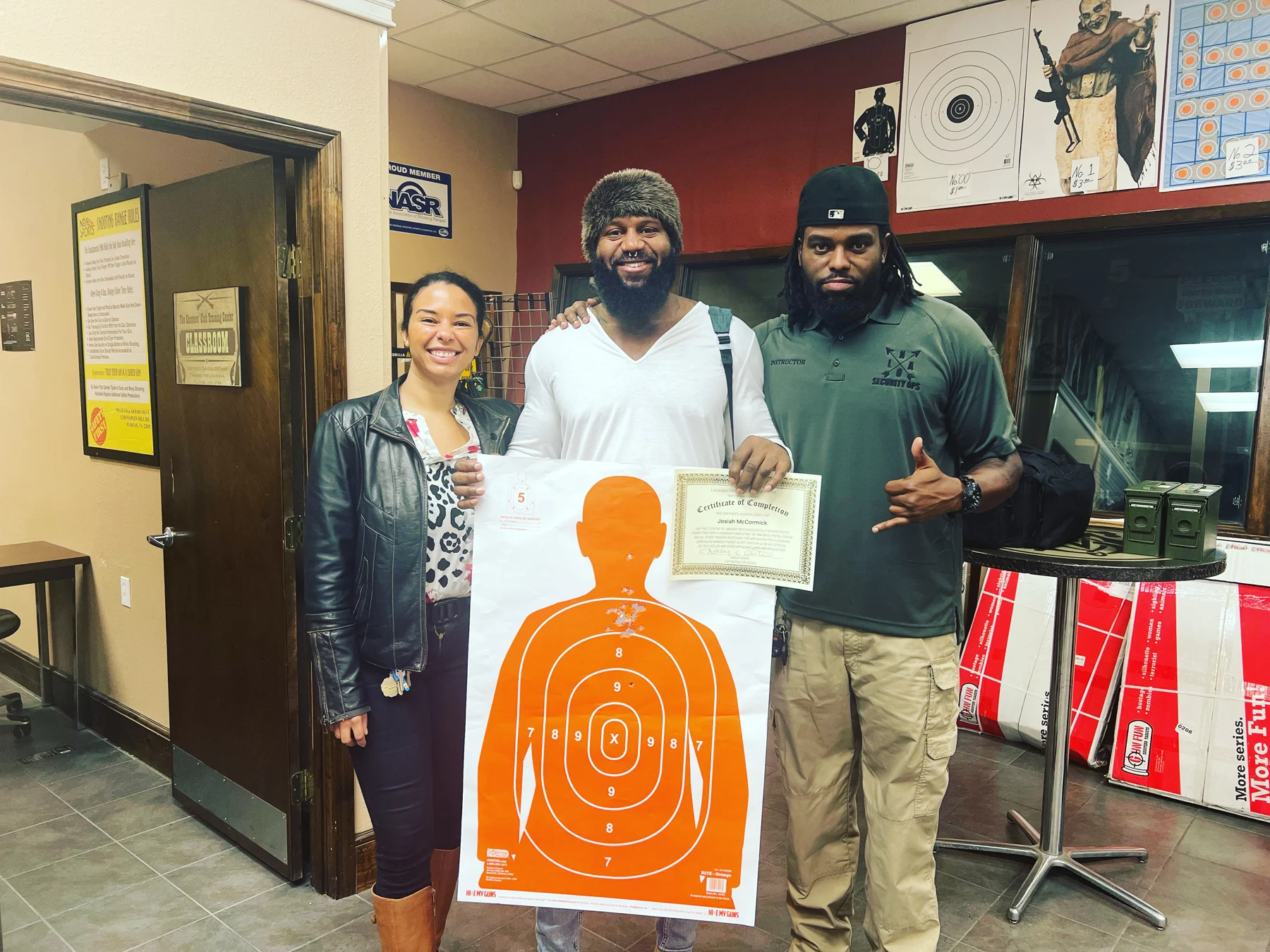 Firearm training participants with their range targets
